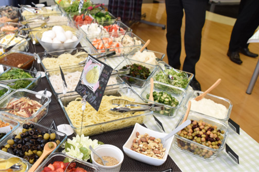 Counter featuring dishes made with Sugar-Free Noodles at an event attended by influencers