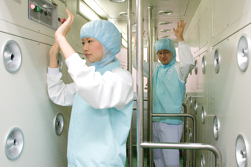 Employees must pass through an air shower to reach the production floor